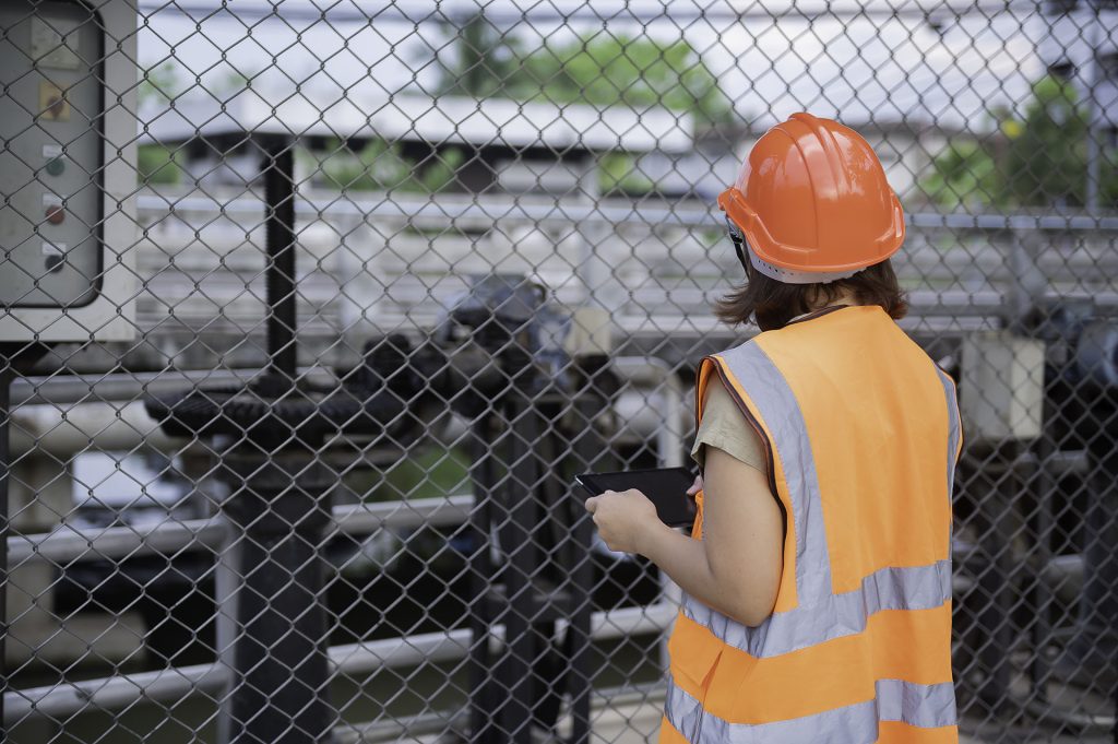 Engineer inspecting a control system